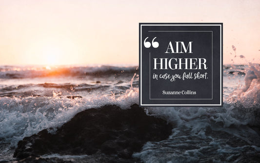 Wallpaper Motivation "Aim Higher In Case You Fall Short"